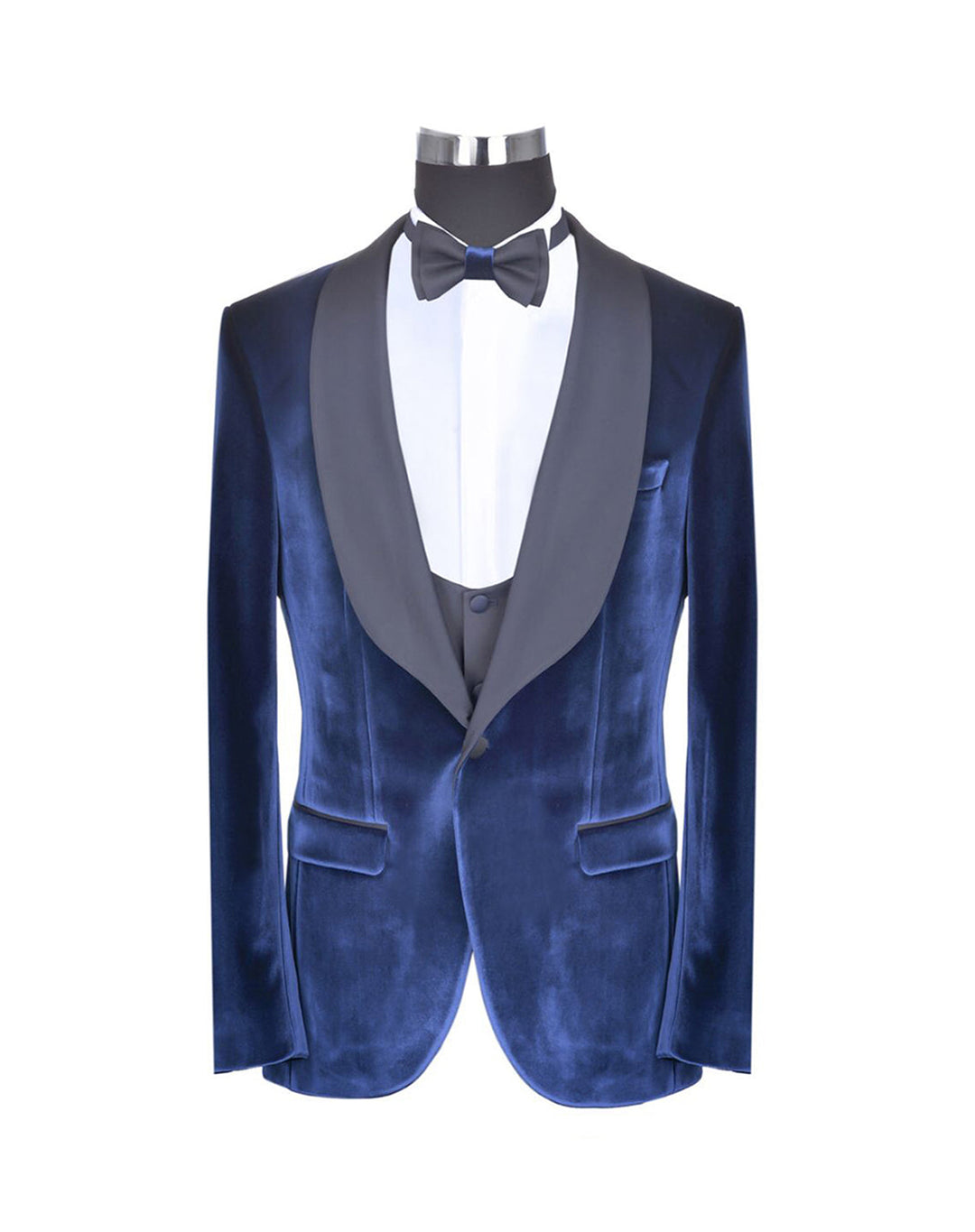 The Anton Navy Velvet Slim Fit Tuxedo with bowtie, vest, and flap pockets for special occasions.