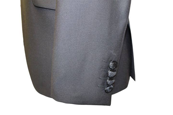Close-up of the sleeve detail on a Velvet Black Tuxedo jacket, showcasing its luxurious fabric and stylish buttons.