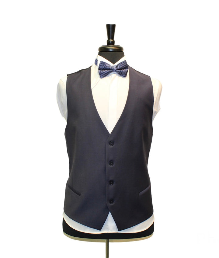 Navy checkered vest from a 3-piece suit for special occasions, styled with white shirt and patterned bow tie.