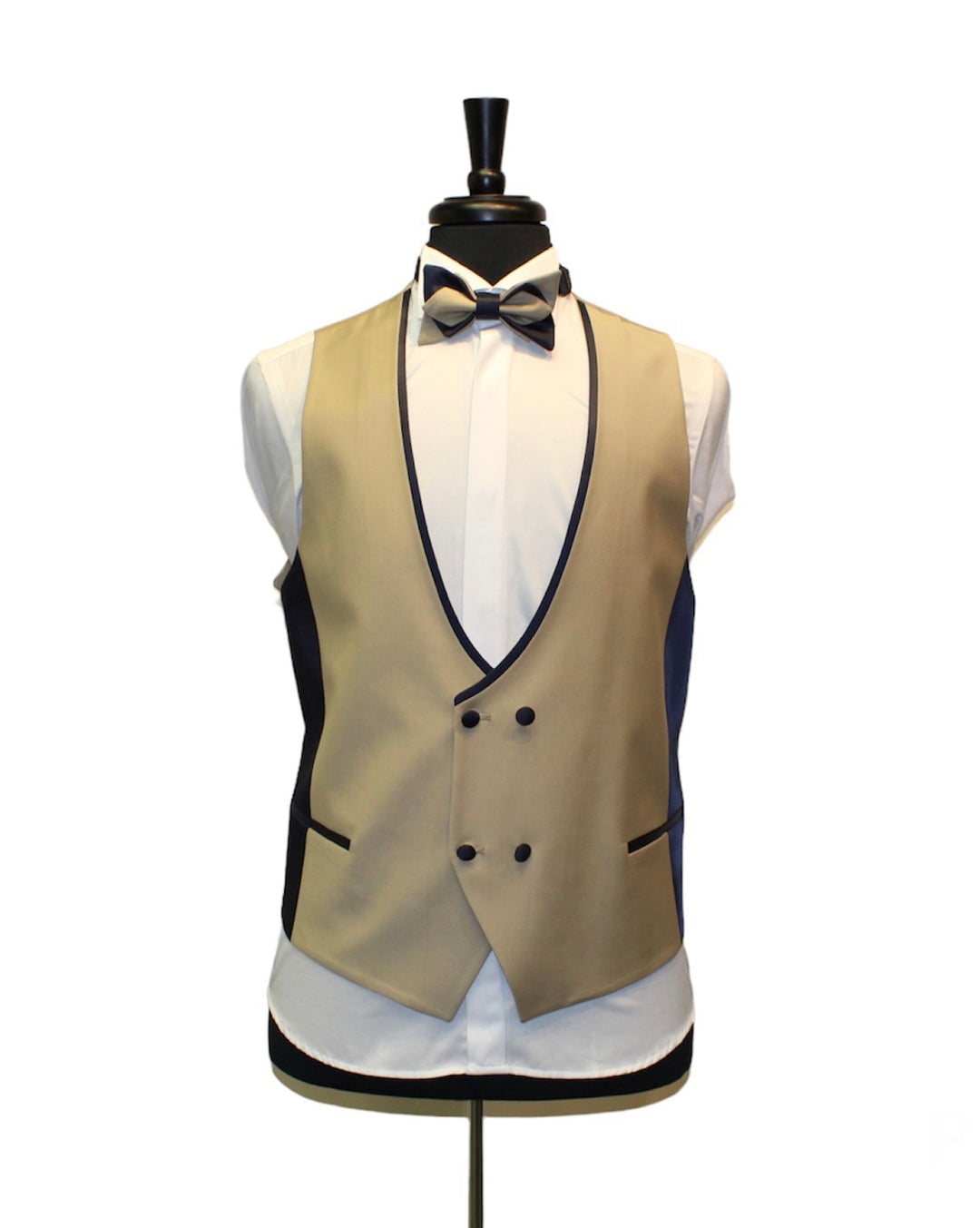Beige tuxedo vest with navy lapels on a mannequin, part of a slim fit 3 piece set (jacket, vest, pants), made of 86% wool, 10% polyamid, 4% elastin