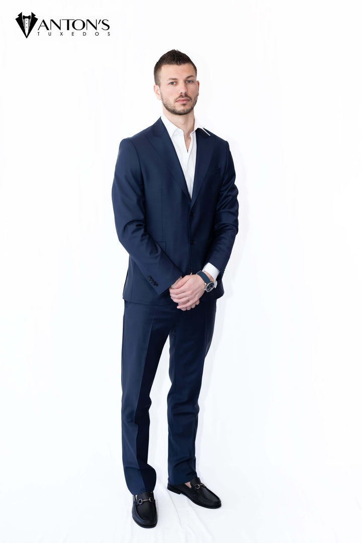 High-quality formal menswear from Anton's summer collection, featuring an elegant suit made of 100% Italian wool – ideal for wedding tuxedos and groom attire.