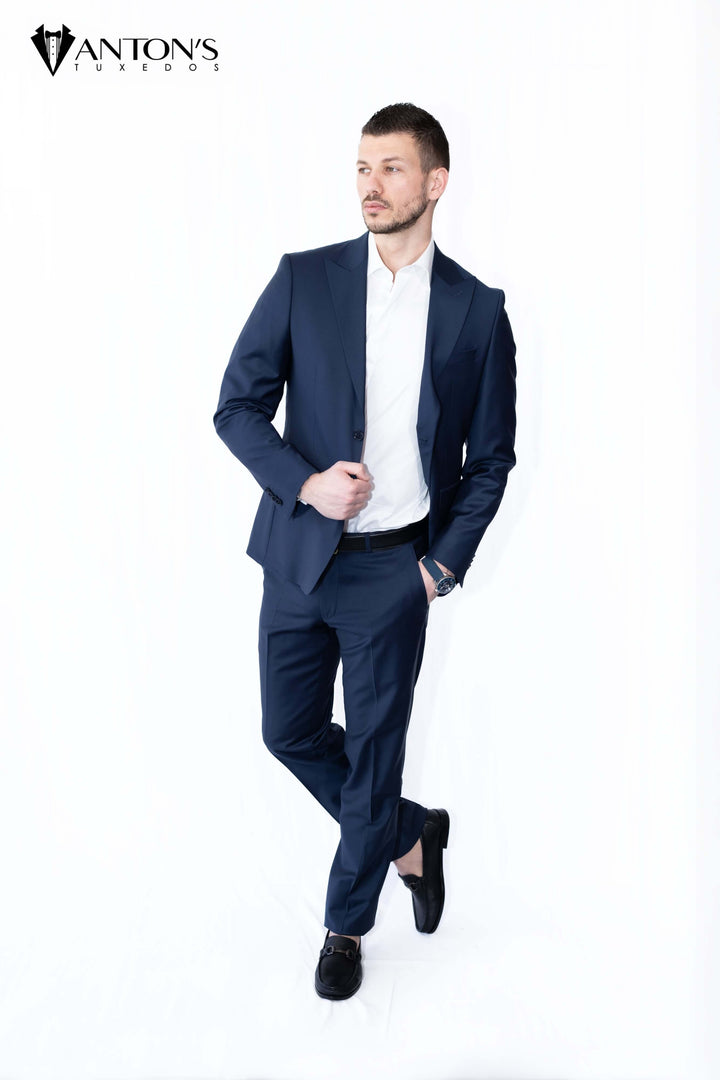 Man wearing Anton's summer collection suit made from 100% Italian wool, ideal for weddings, formal menswear, groom attire, and classic tuxedo styles.